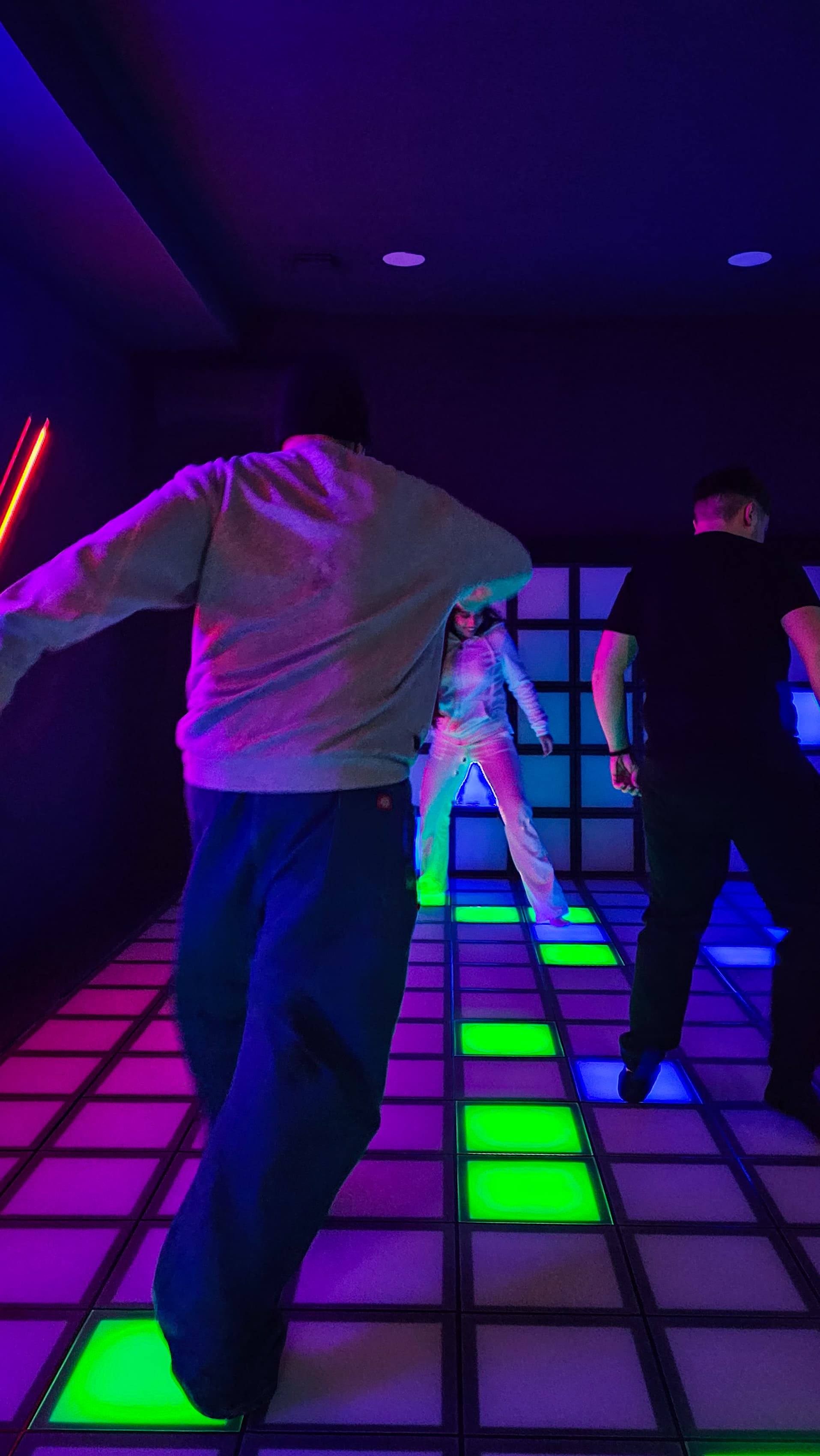 A vibrant, interactive floor with glowing red and blue tiles.