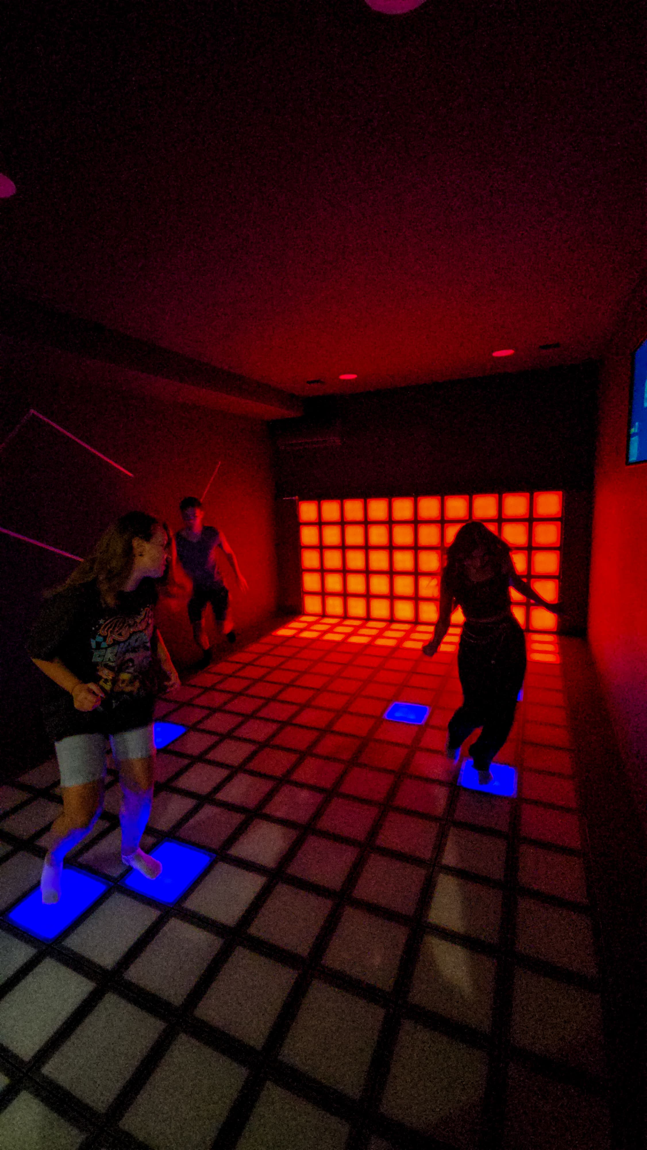 The interactive floor glowing in the dark.